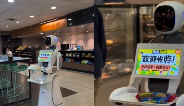 Dos robots atienden las mesas en una estación de servicio en Roldán
